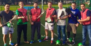 Discover your Inner Warrior Through Hurling! Hats Off, Battle Done! All standing after a hurling game with an American group, Summer 2017.