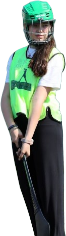 Young athlete in green helmet and vest holding a hockey stick, ready to play field hockey.